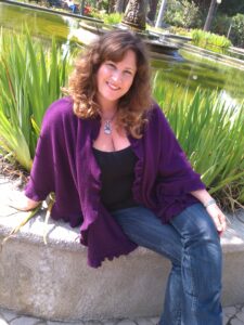 Fav-tina-sitting-on-bench (225x300)